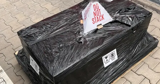 GPU server on a pallet, wrapped for delivery within the EU